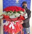 99 or 101 Fresh Big Red Roses with White Filler in Basket